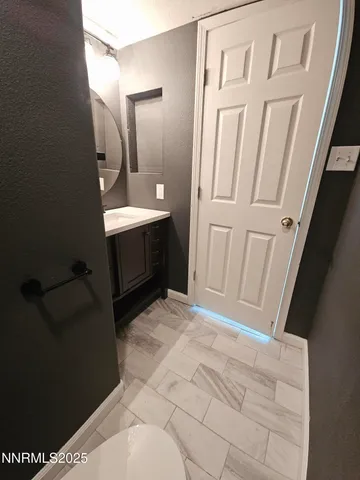 a kitchen with a stove and a refrigerator