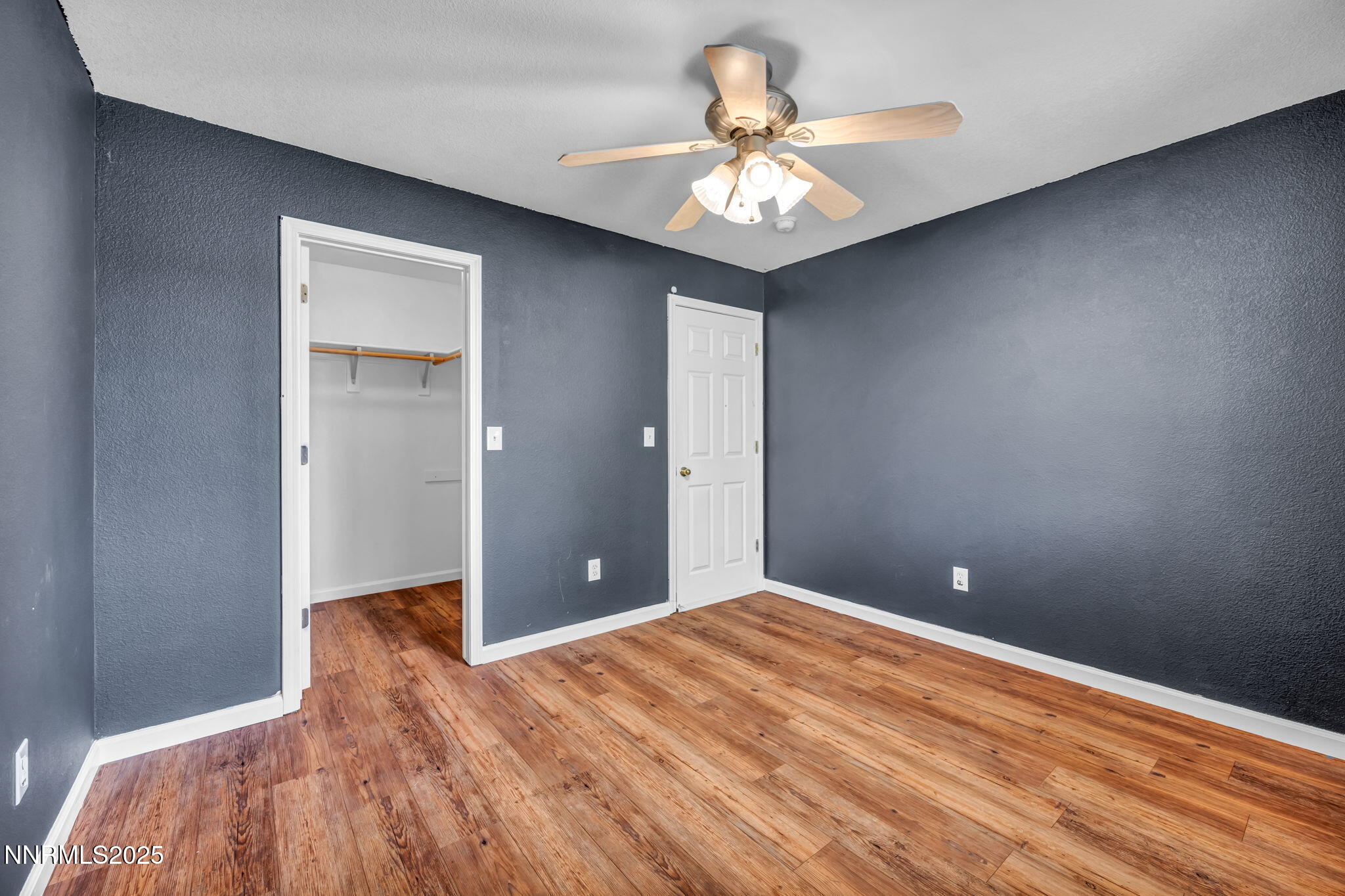 17702 Clear Springs Court Reno, NV 89508 - Photo 22 of 41 a view of a bedroom with a large bed