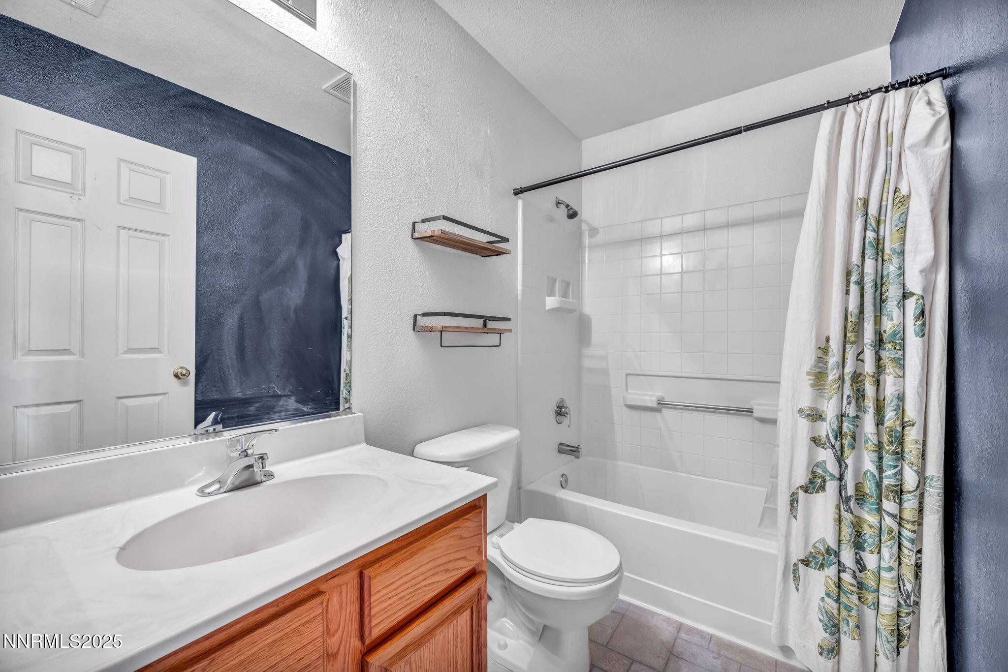 17702 Clear Springs Court Reno, NV 89508 - Photo 23 of 41 a bathroom with a sink toilet and shower