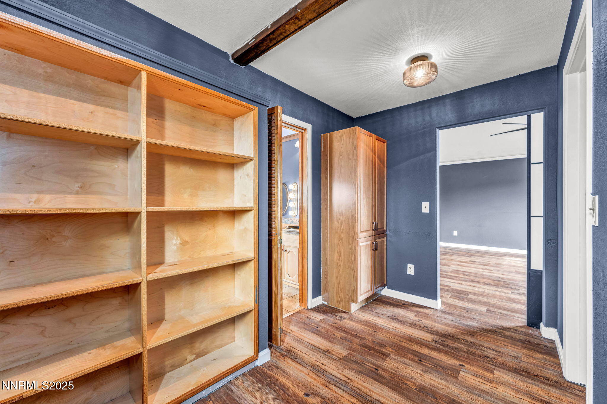 17702 Clear Springs Court Reno, NV 89508 - Photo 27 of 41 a view of an empty room with a cabinet and a window