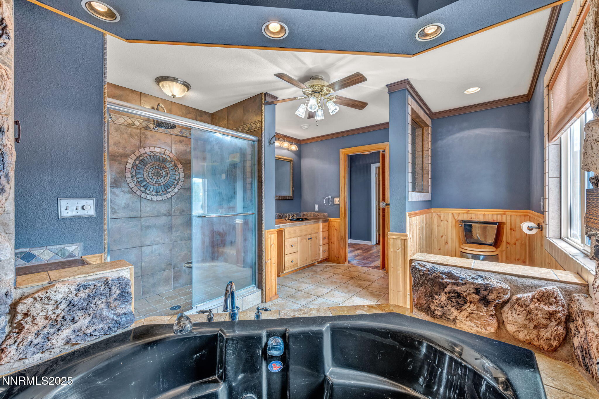 17702 Clear Springs Court Reno, NV 89508 - Photo 32 of 41 a kitchen with stainless steel appliances granite countertop a stove and cabinets