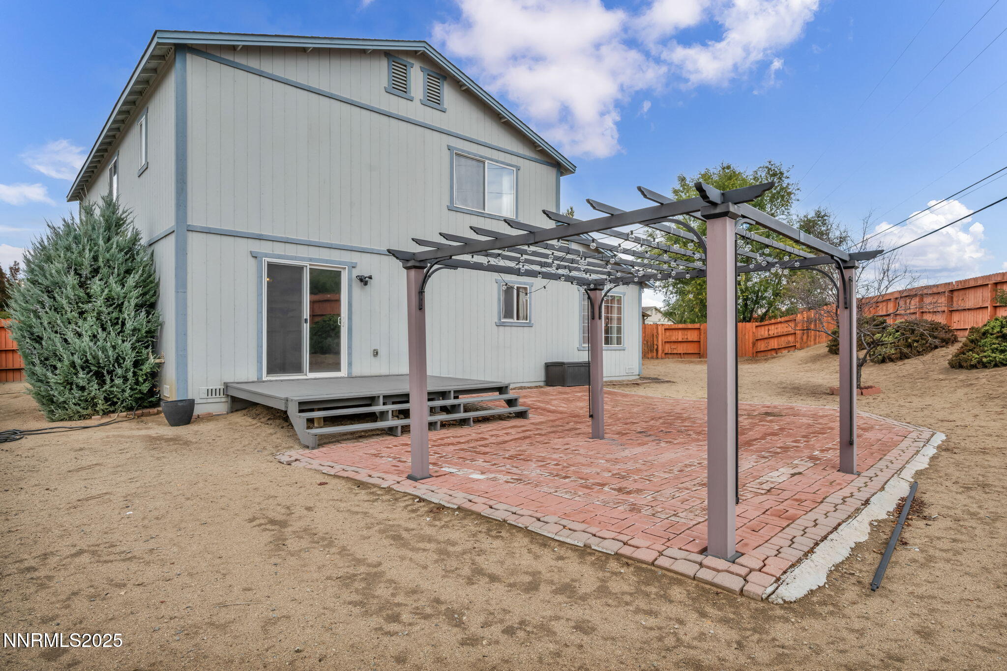 17702 Clear Springs Court Reno, NV 89508 - Photo 33 of 41 a view of a house with backyard and sitting area