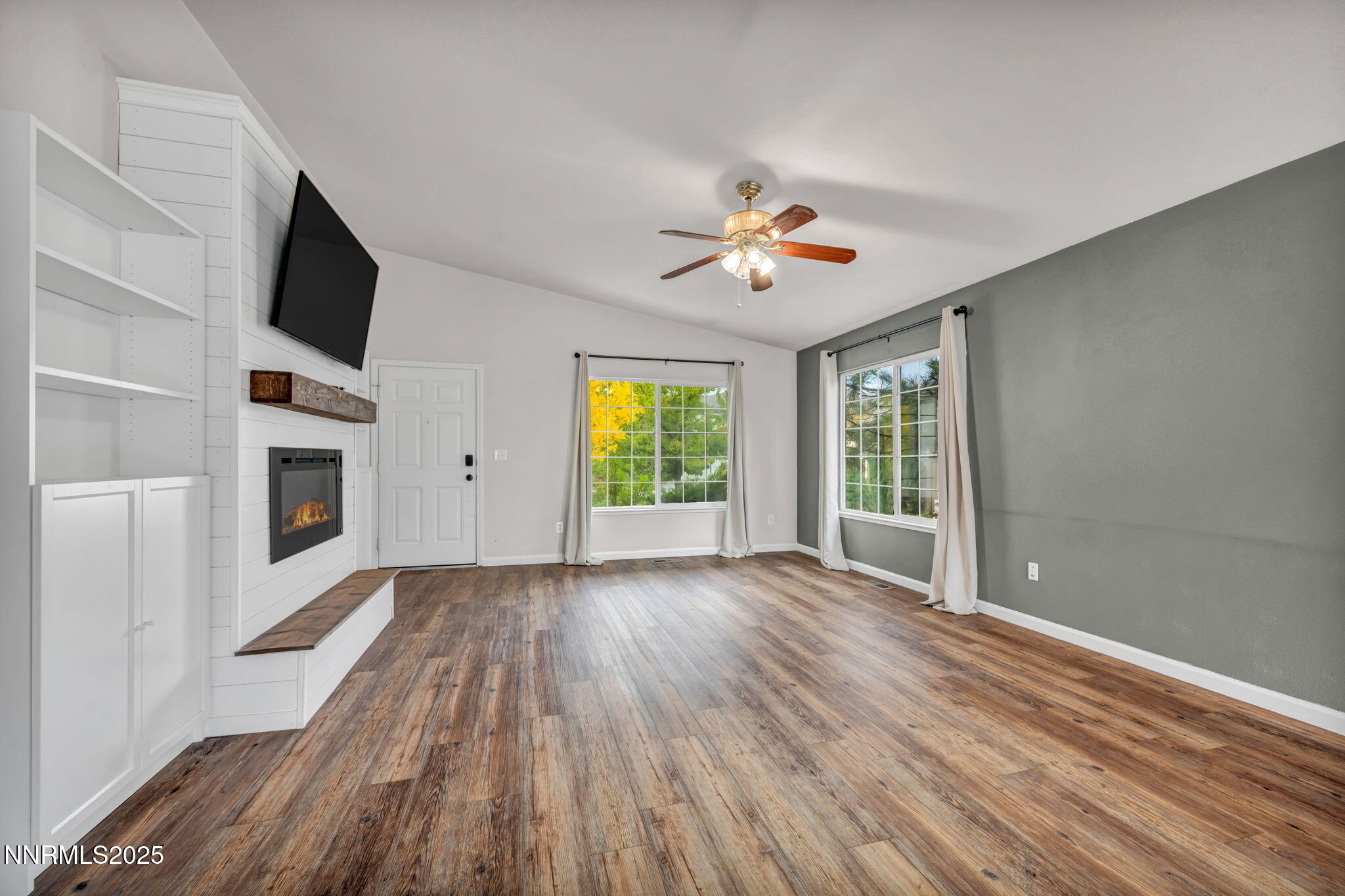 17702 Clear Springs Court Reno, NV 89508 - Photo 6 of 41 wooden floor in an empty room with a window