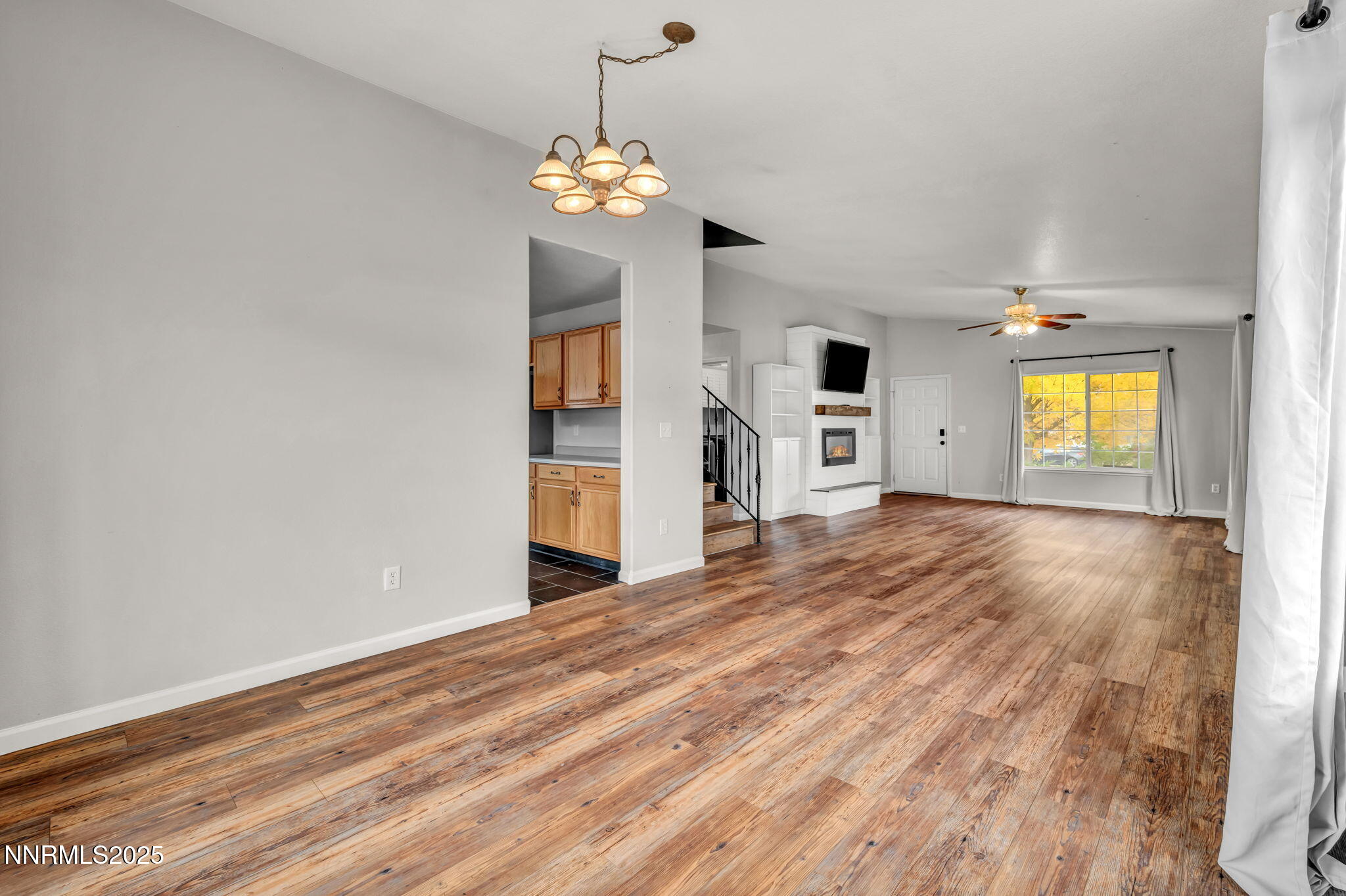 17702 Clear Springs Court Reno, NV 89508 - Photo 7 of 41 a view of a livingroom with a chandelier