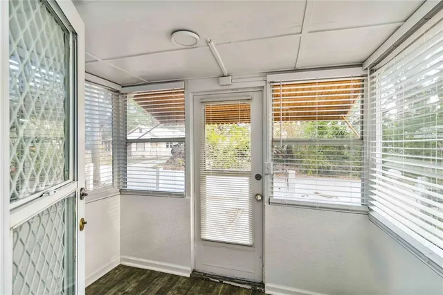 a view of a room with a large window