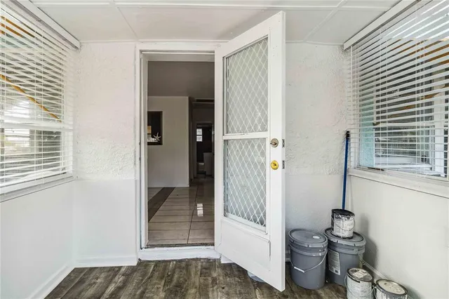 a view of entryway with wooden floor