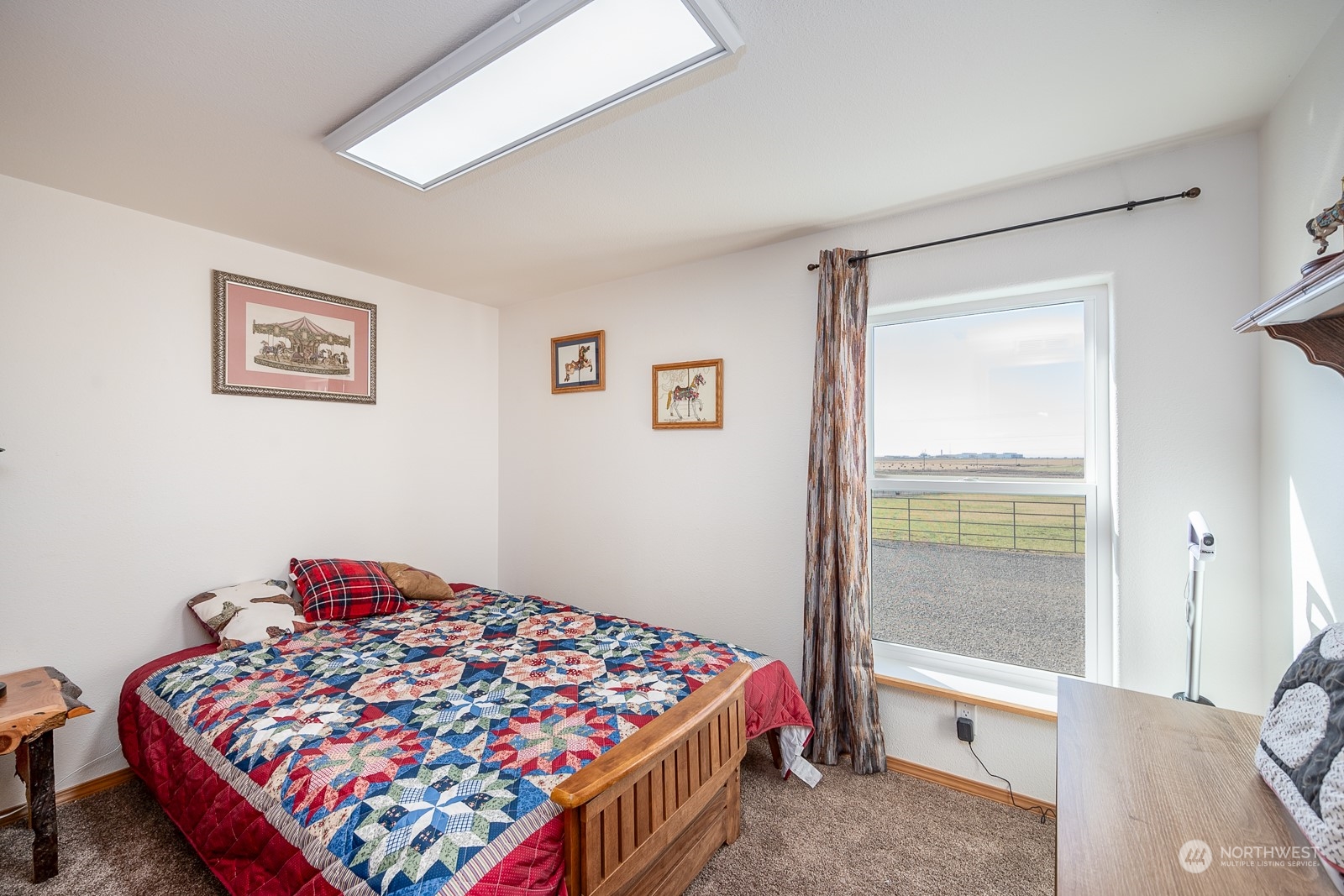 8079 Ne Road North Moses Lake, WA 98837 - Photo 19 of 26 a bedroom with bed and a window