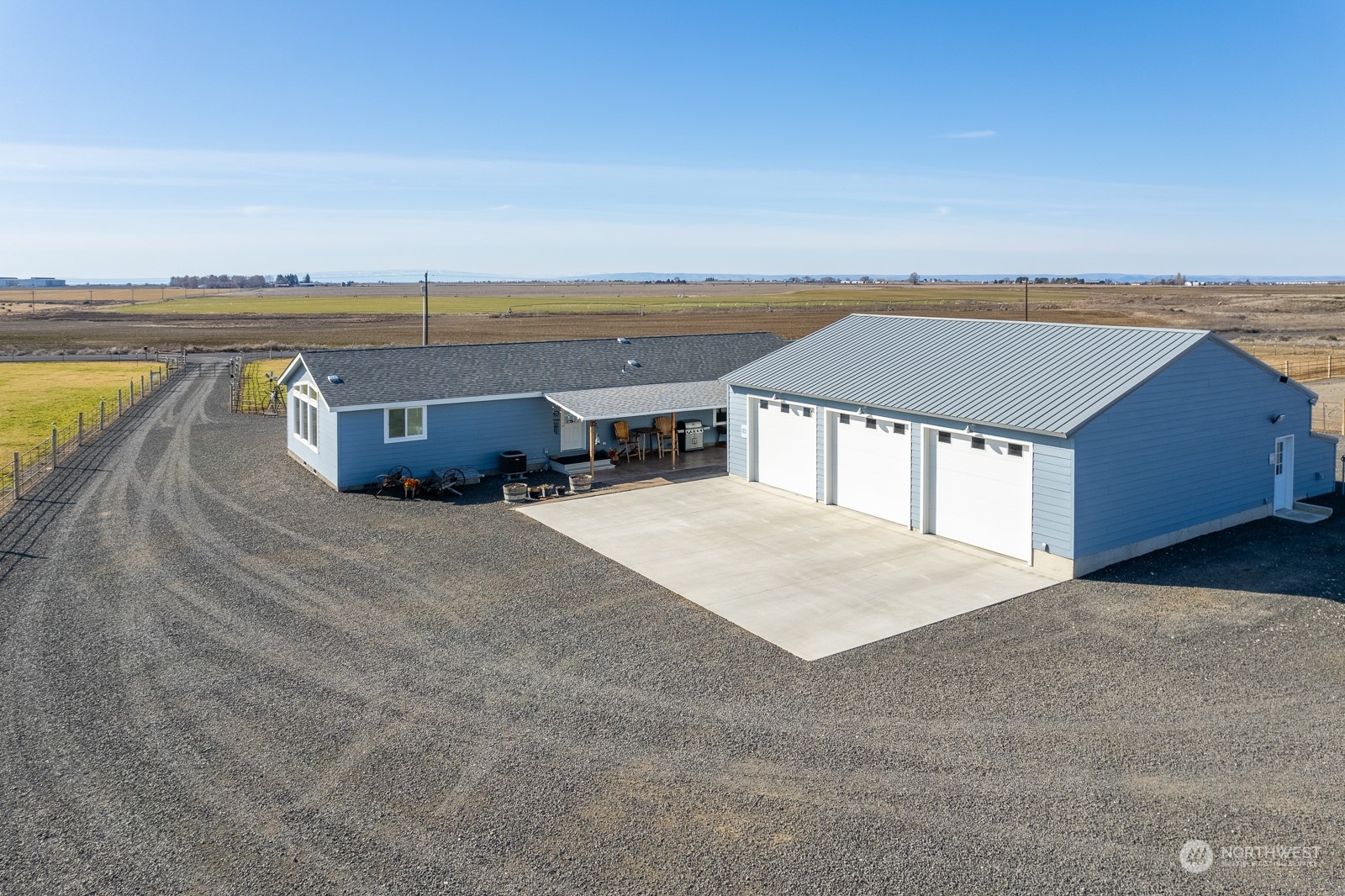 8079 Ne Road North Moses Lake, WA 98837 - Photo 2 of 26 a view of a swimming pool with an ocean view