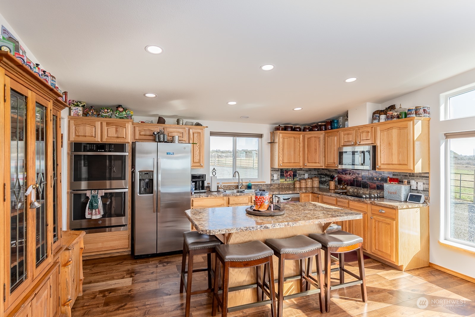 8079 Ne Road North Moses Lake, WA 98837 - Photo 25 of 26 a kitchen with a table and chairs