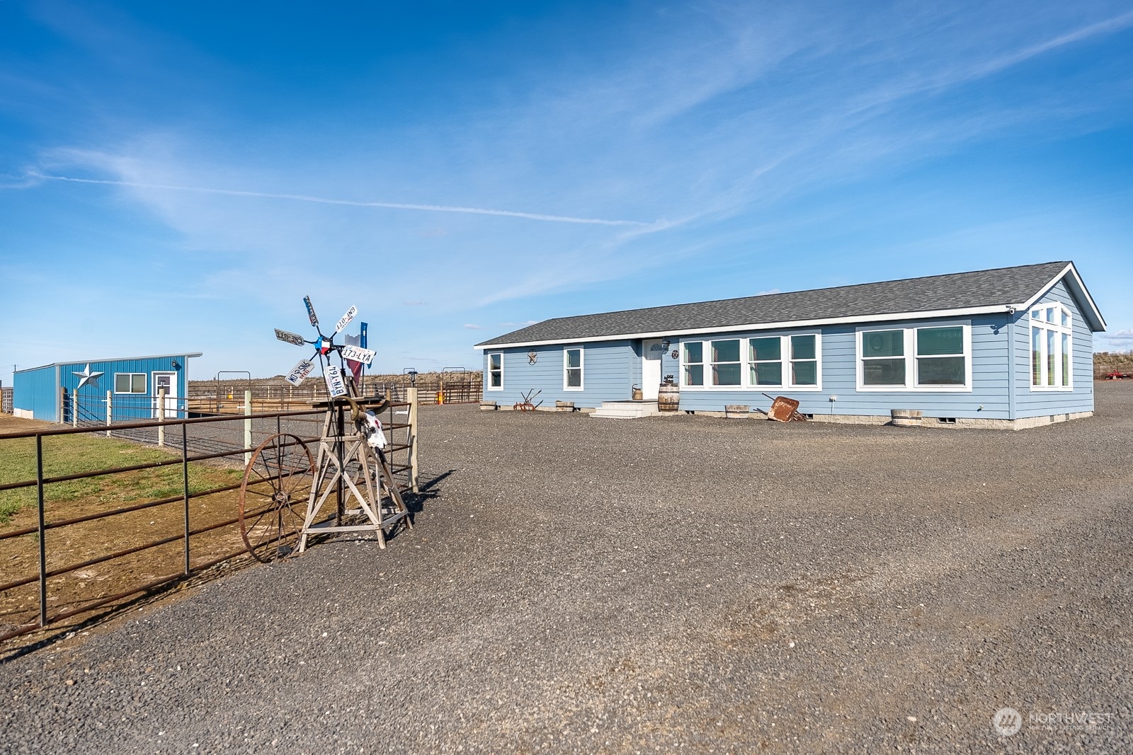 8079 Ne Road North Moses Lake, WA 98837 - Photo 7 of 26 a view of a house with a balcony