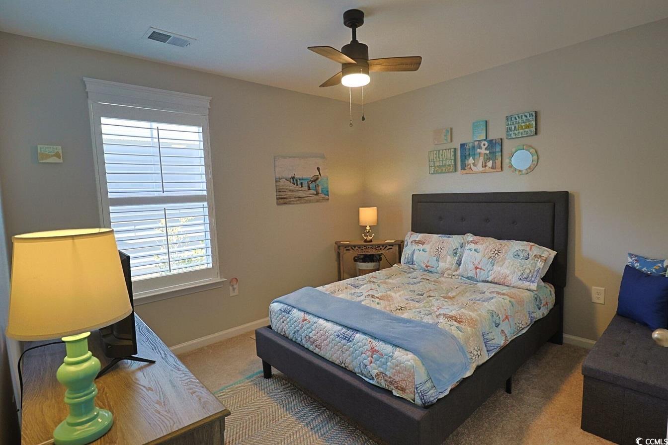 127 Clover Walk Drive Conway, SC 29526 - Photo 11 of 36 Carpeted bedroom with ceiling fan, visible vents,