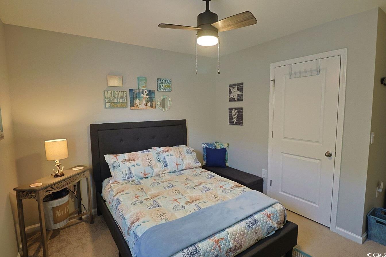 127 Clover Walk Drive Conway, SC 29526 - Photo 12 of 36 Bedroom with light carpet, ceiling fan, and basebo