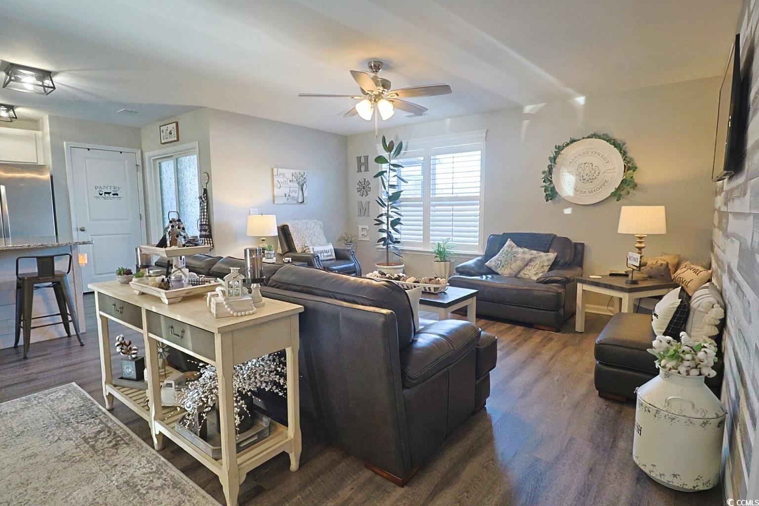 127 Clover Walk Drive Conway, SC 29526 - Photo 21 of 36 Living area featuring a fireplace, a ceiling fan,