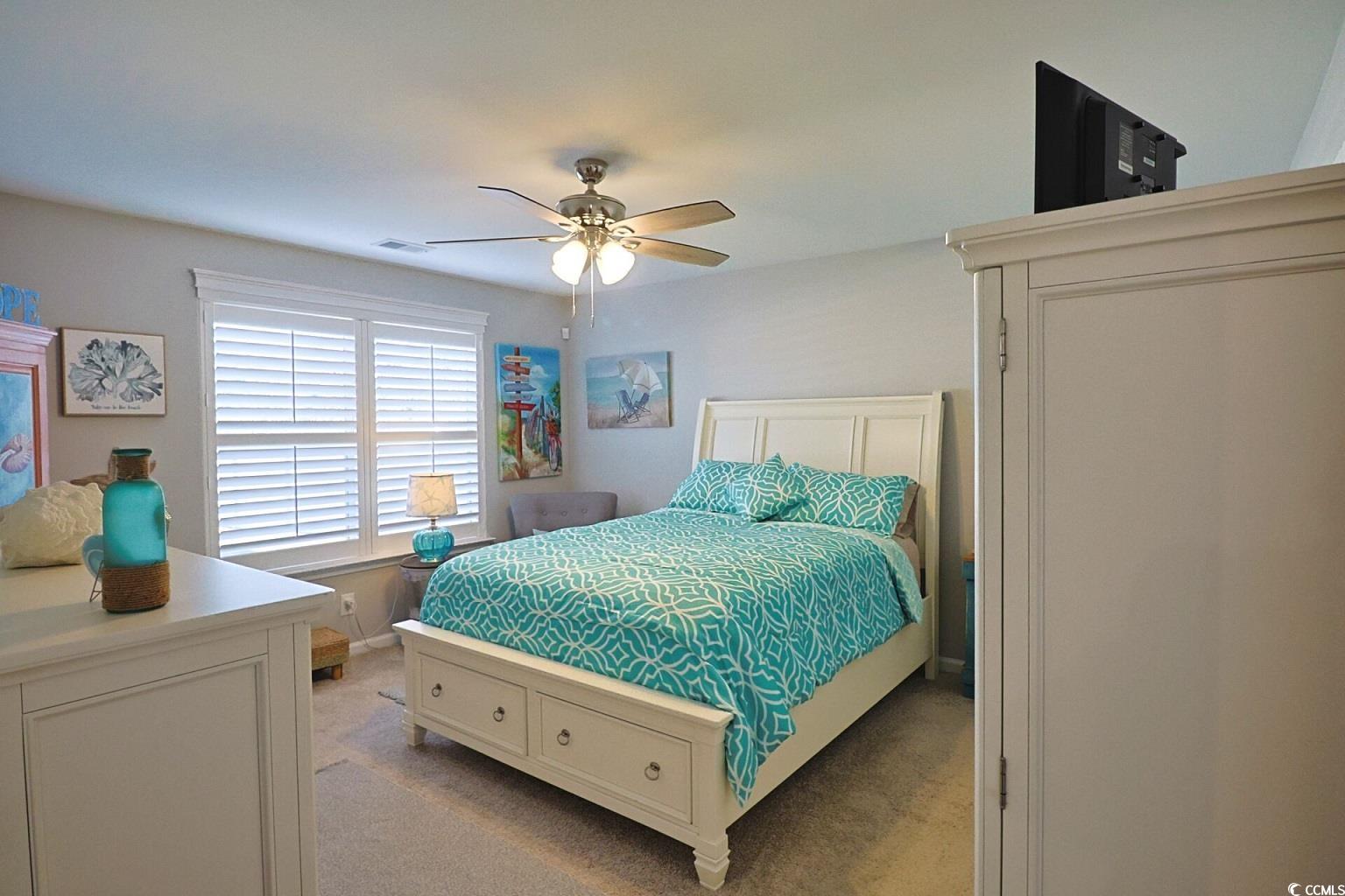 127 Clover Walk Drive Conway, SC 29526 - Photo 24 of 36 Bedroom featuring light colored carpet, visible ve