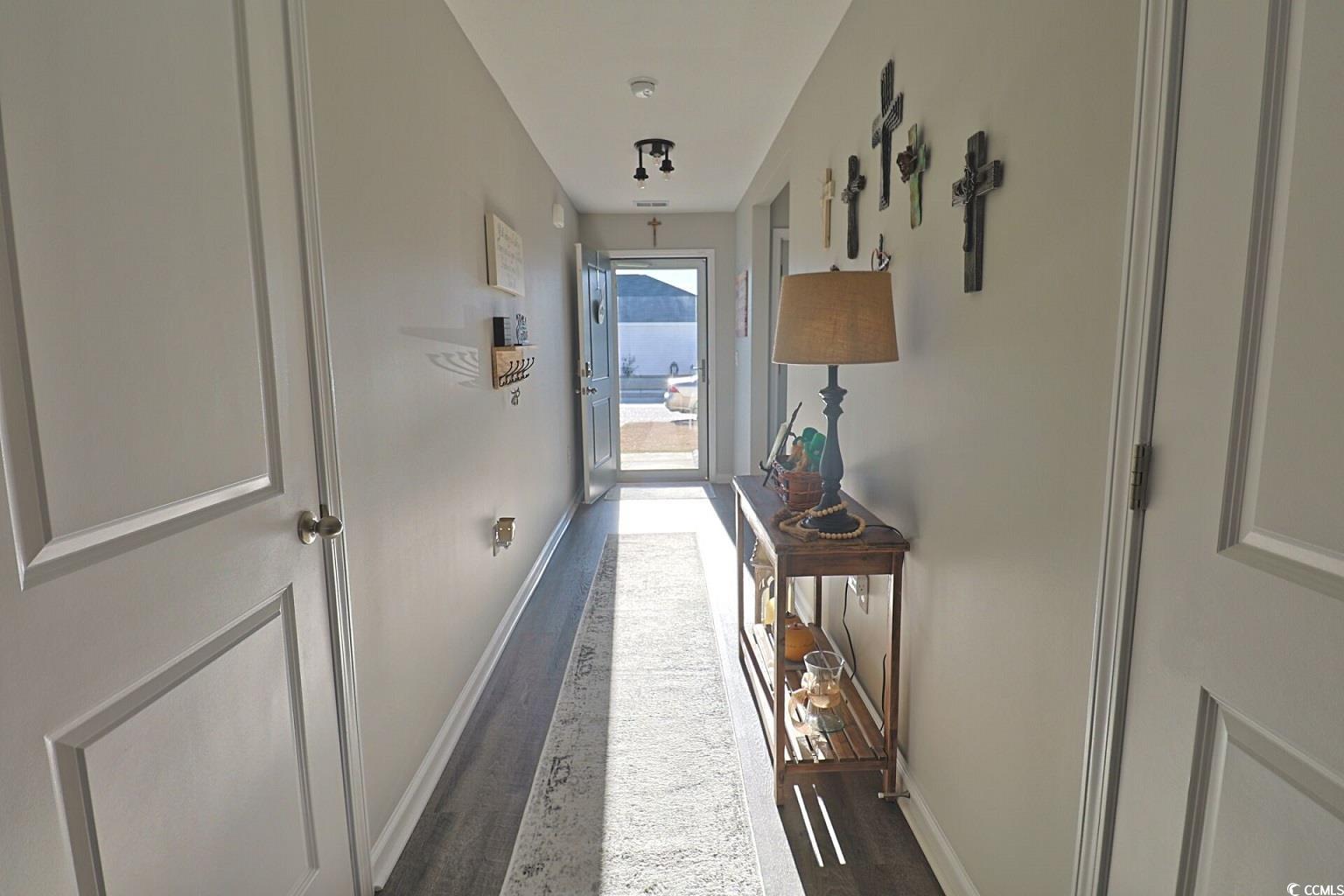 127 Clover Walk Drive Conway, SC 29526 - Photo 7 of 36 Entryway featuring dark wood-style flooring and ba
