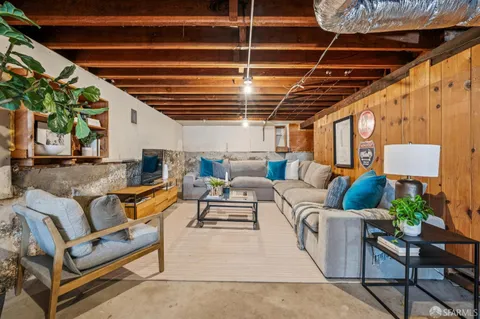 a outdoor living space with furniture and a couch