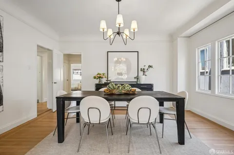 a view of a dining room with furniture