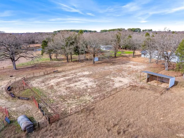 a view of a town with mountains in the background