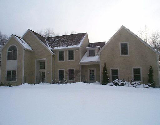 25 Black Pine Ridge Ridgefield, CT 06877 - Photo 1 of 1 a view of a house with a yard