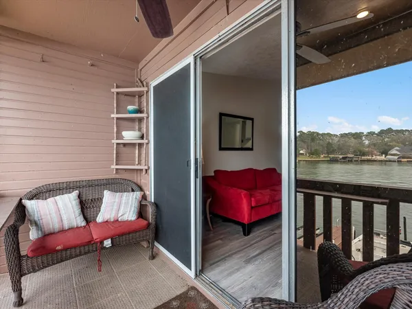 a balcony with furniture and view of balcony
