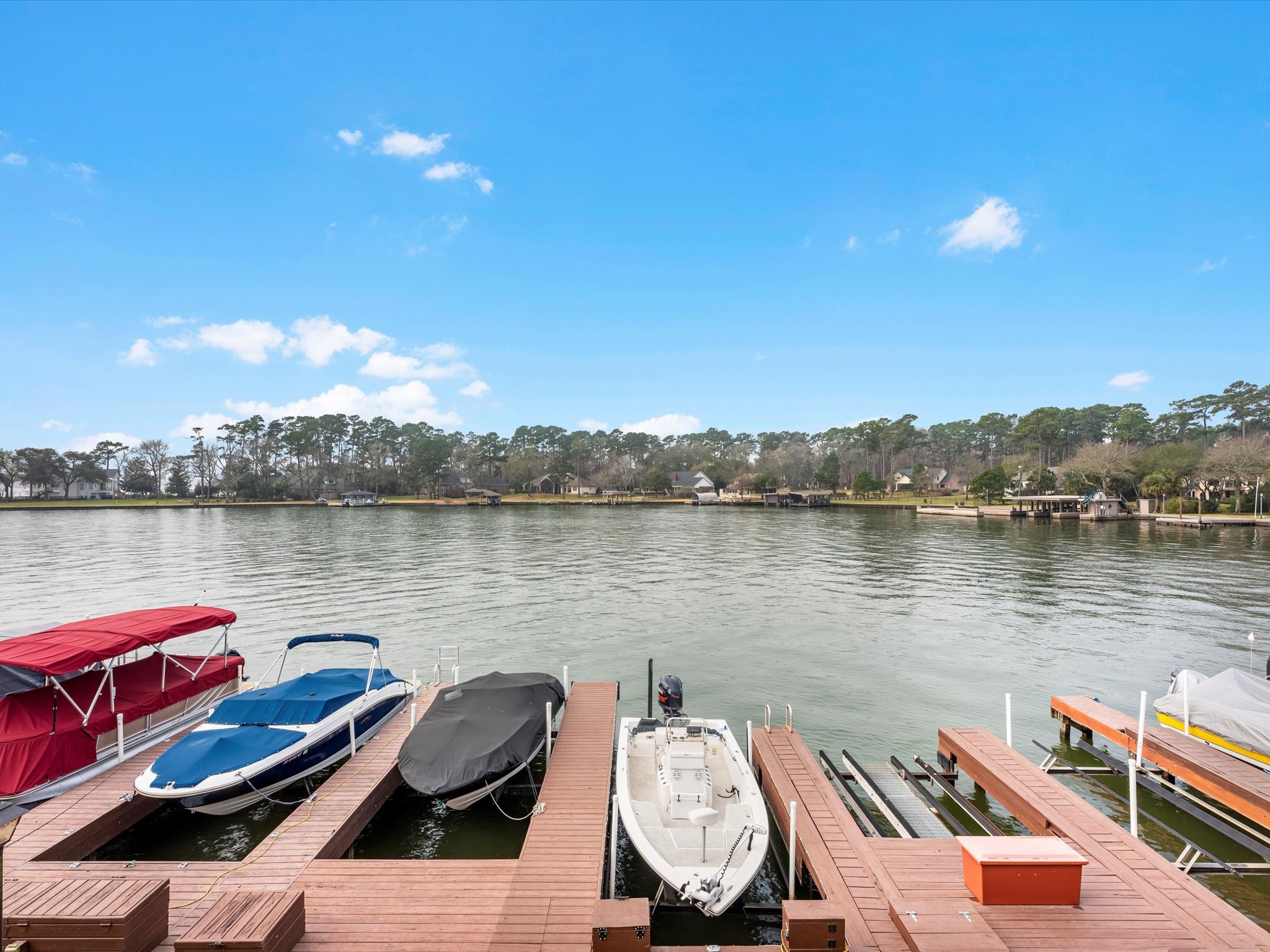 801 River Road, Unit 114F Montgomery, TX 77356 - Photo 21 of 25 a view of a lake with chairs