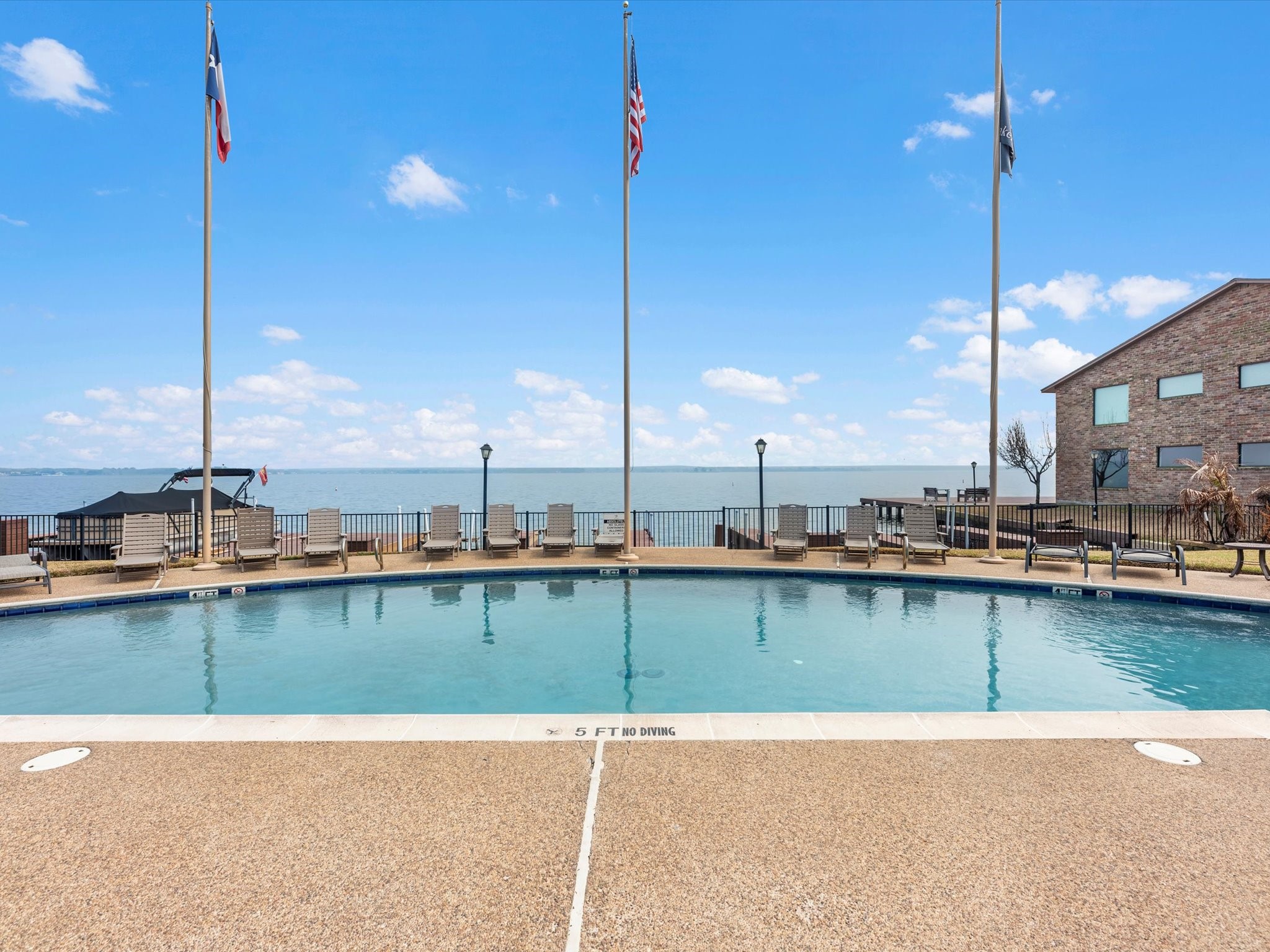 801 River Road, Unit 114F Montgomery, TX 77356 - Photo 24 of 25 a view of a swimming pool and outdoor seating