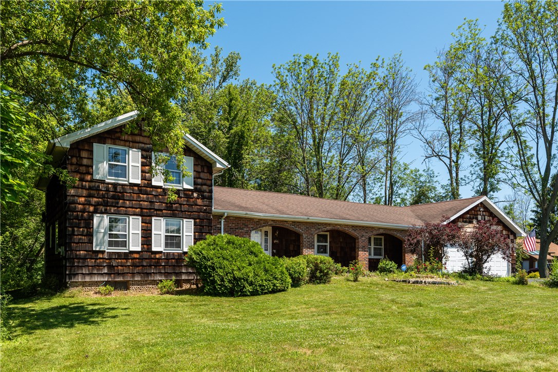 200 Janes Road Greece, NY 14612 - Photo 1 of 1 beautiful home with naturally weathered cedar shak