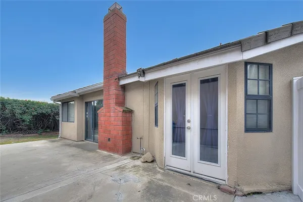 a view of a house with a yard and garage