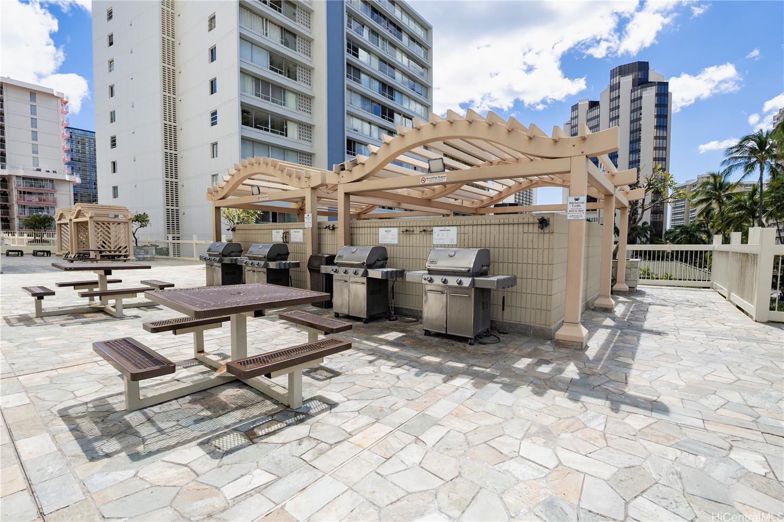 445 Seaside Avenue, Unit 2006 Honolulu, HI 96815 - Photo 17 of 23 a view of a patio with a patio