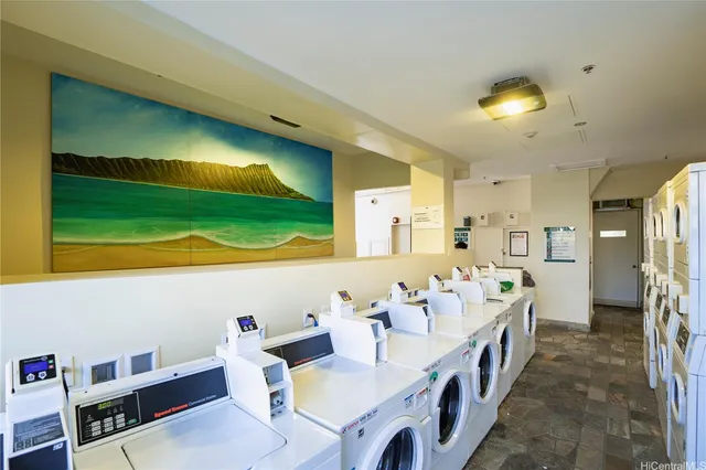 a very nice looking room with kitchen view