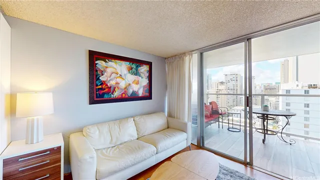 a living room with furniture and a large window