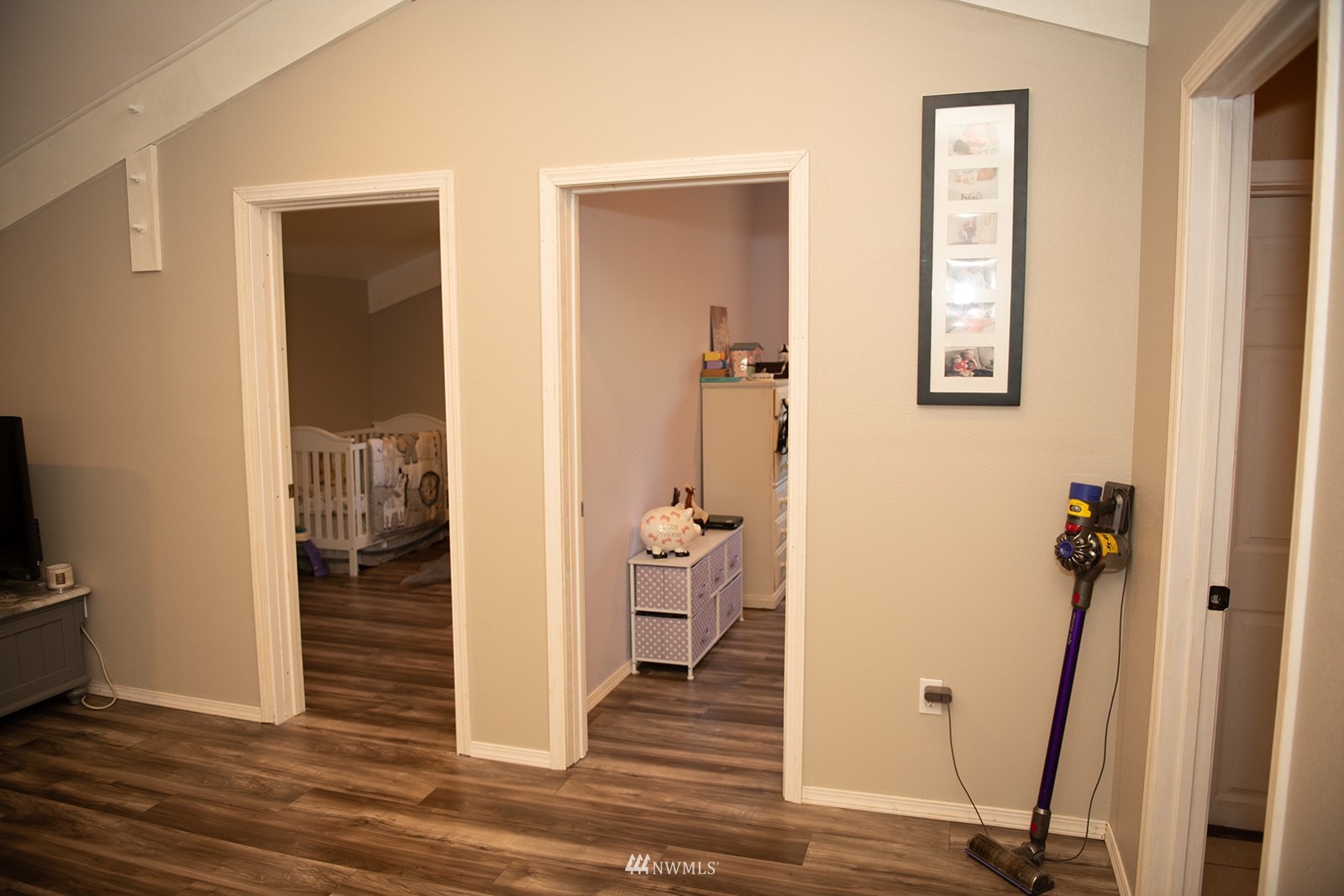 650-38 Logan Hill Road Chehalis, WA 98532 - Photo 14 of 36 a view of a hallway with wooden floor and a living room