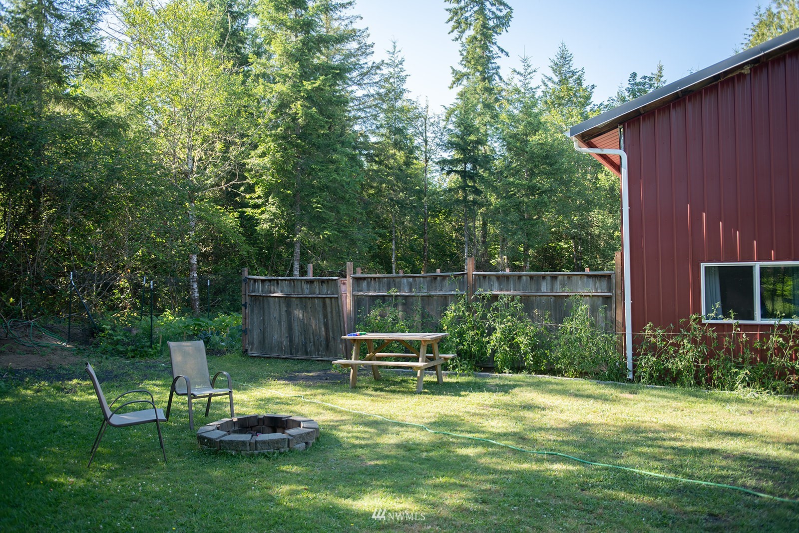 650-38 Logan Hill Road Chehalis, WA 98532 - Photo 33 of 36 a view of a chair and table in the garden