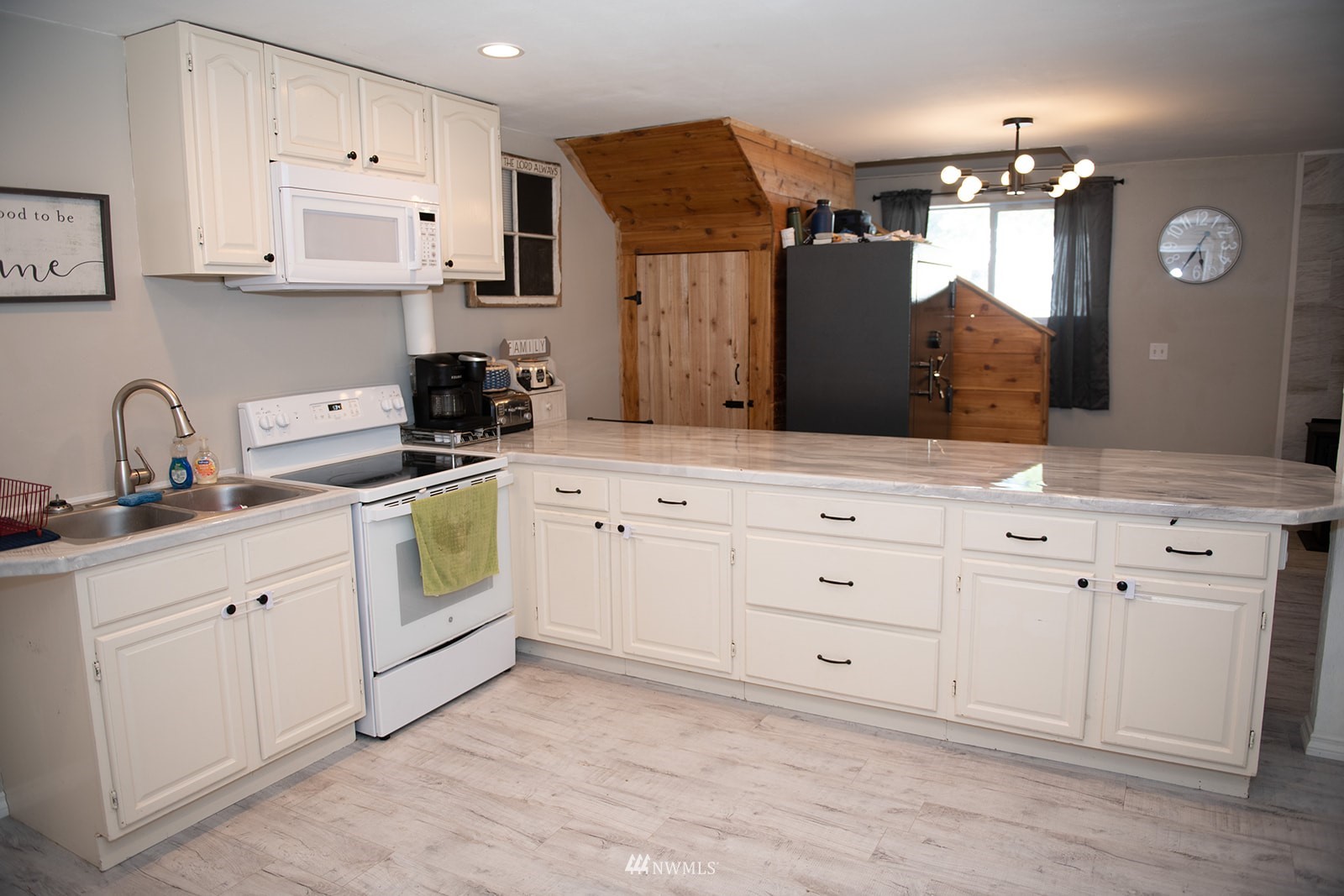 650-38 Logan Hill Road Chehalis, WA 98532 - Photo 5 of 36 a kitchen with stainless steel appliances white cabinets and sink