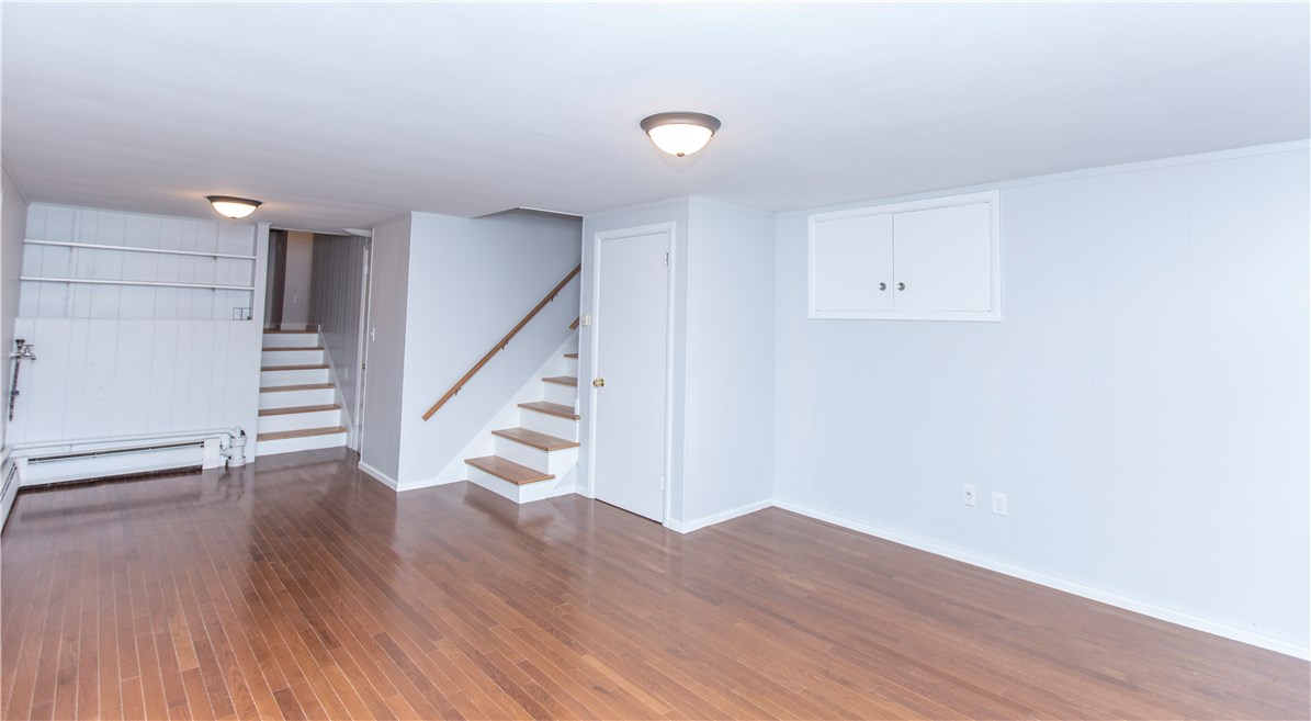 101 Amherst Road Cranston, RI 02920 - Photo 14 of 26 Family Room~ Office~ Workout Area~ Studio In-law Possibilities as it also has access to a Private Full Bath and additional living area~