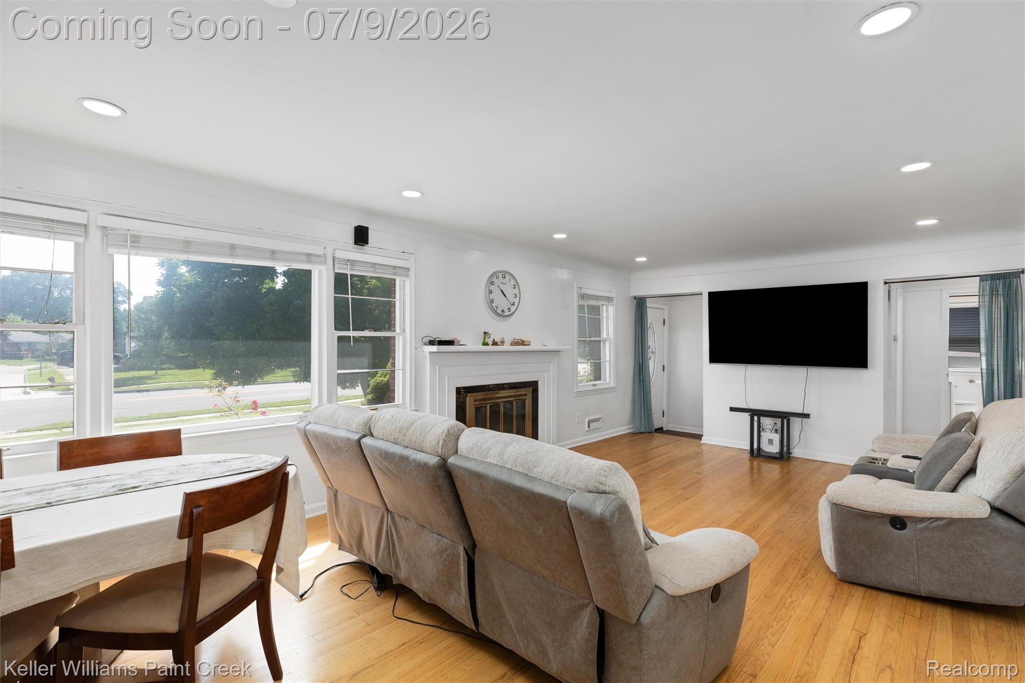 2731 Crooks Road Royal Oak, MI 48073 - Photo 10 of 34 Open-concept living area featuring wood-finish flooring and recessed ceiling lighting