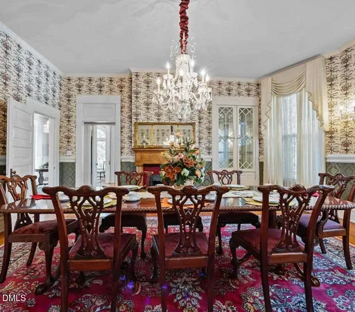 a kitchen with stainless steel appliances a refrigerator sink and cabinets
