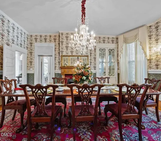 a kitchen with stainless steel appliances a refrigerator sink and cabinets