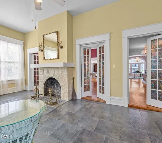 a bathroom with a sink toilet and a mirror