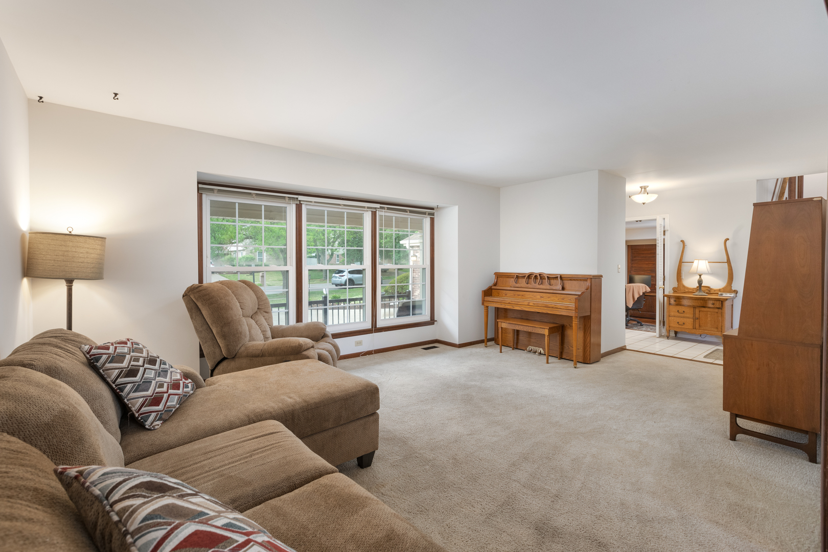 1616 Apache Drive Naperville, IL 60563 - Photo 11 of 36 a living room with furniture and a couch