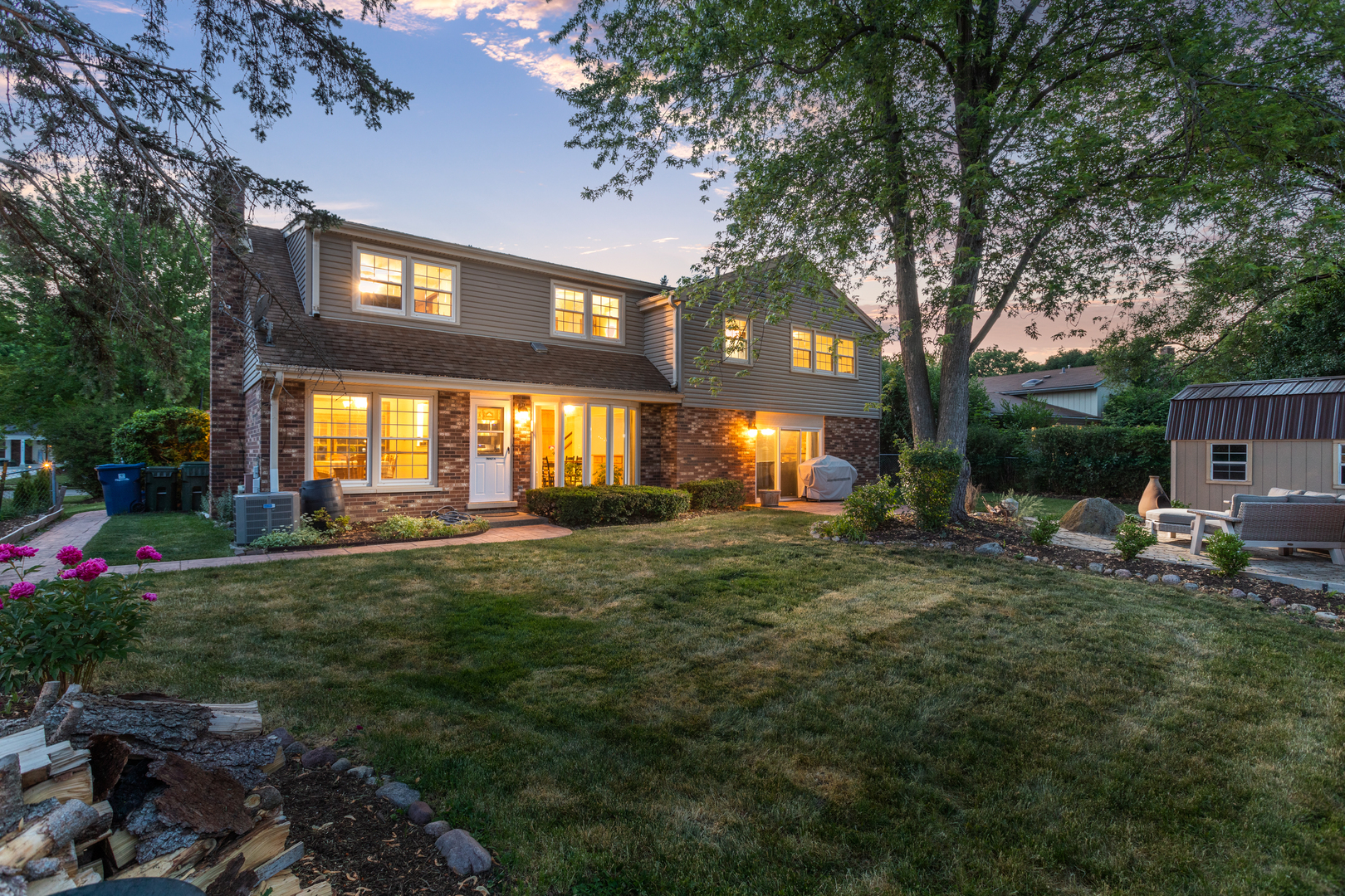 1616 Apache Drive Naperville, IL 60563 - Photo 2 of 36 a view of a house with backyard and sitting area