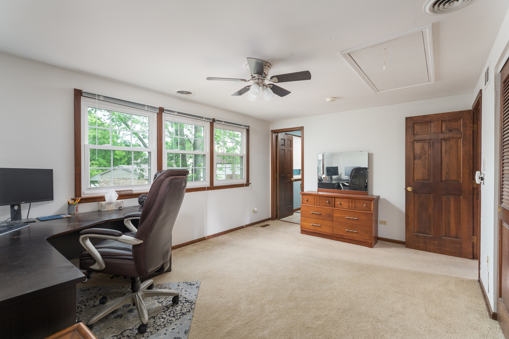 1616 Apache Drive Naperville, IL 60563 - Photo 24 of 36 a view of a workspace with furniture and a window