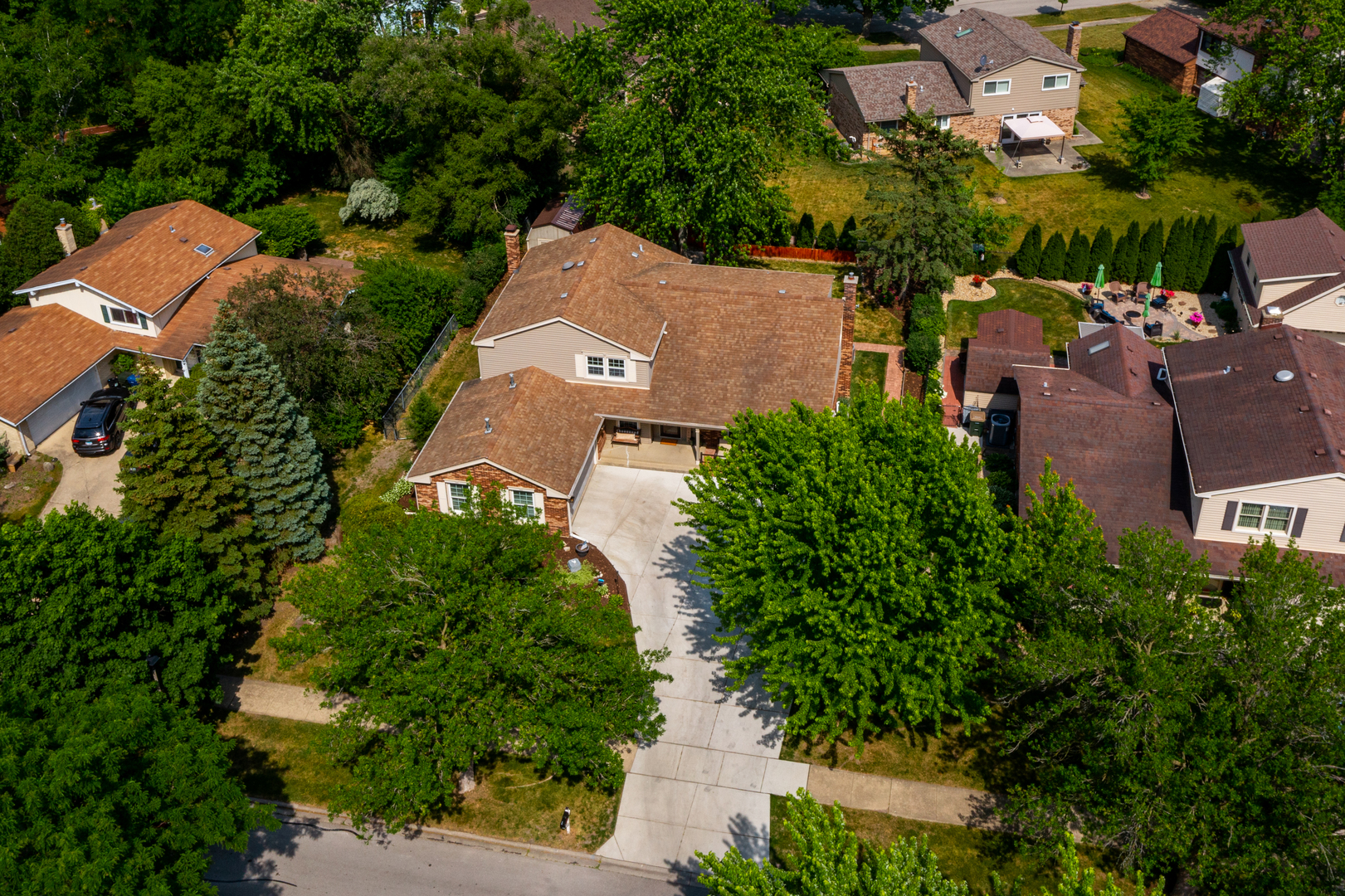 1616 Apache Drive Naperville, IL 60563 - Photo 35 of 36 an aerial view of residential houses with outdoor space and trees all around