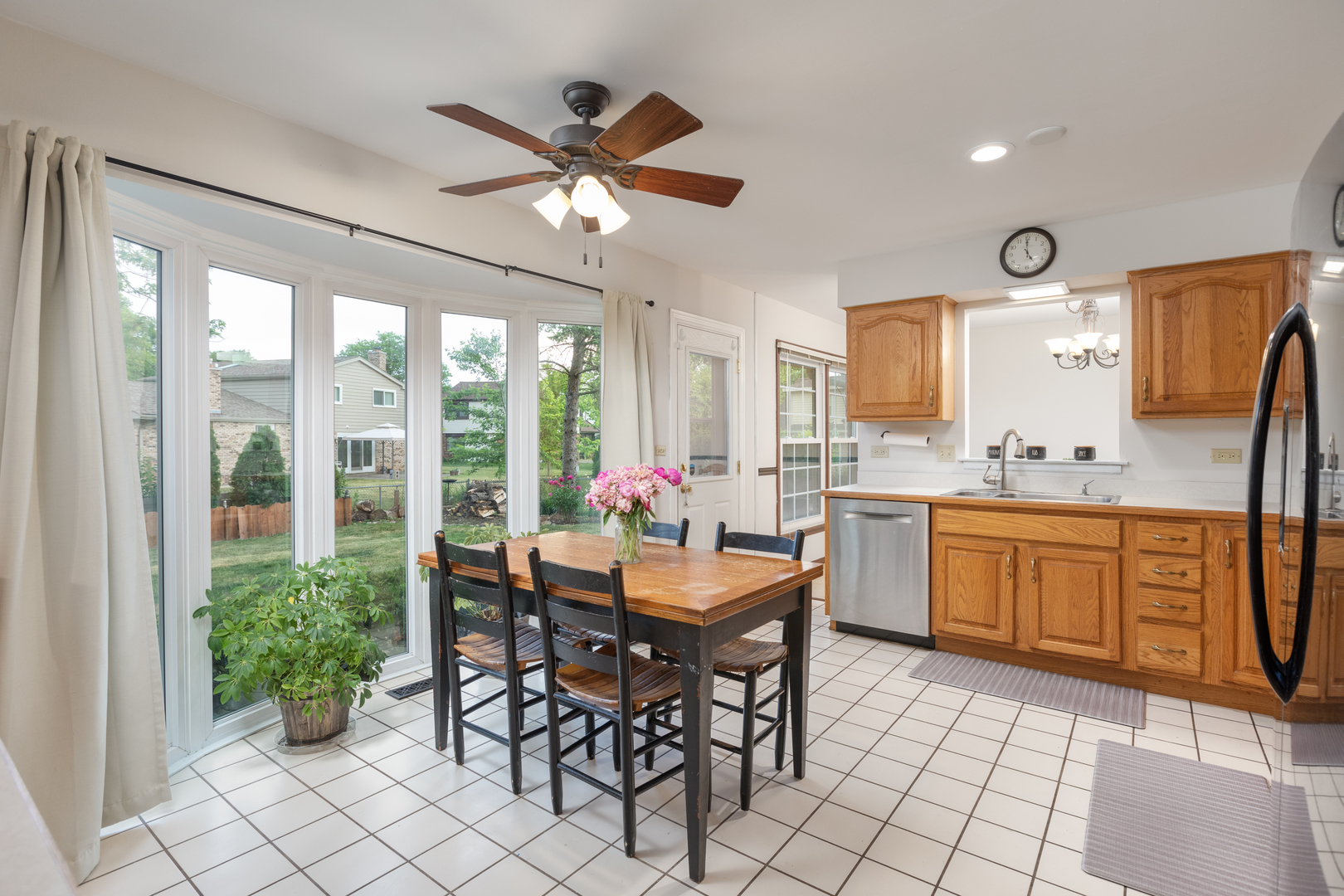 1616 Apache Drive Naperville, IL 60563 - Photo 5 of 36 a view of a dining room with furniture window and outside view