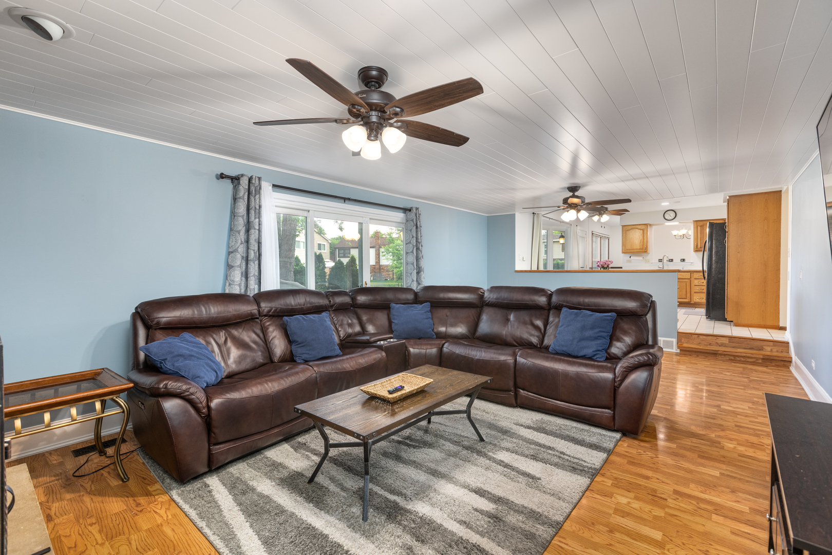 1616 Apache Drive Naperville, IL 60563 - Photo 8 of 36 a living room with furniture and a wooden floor