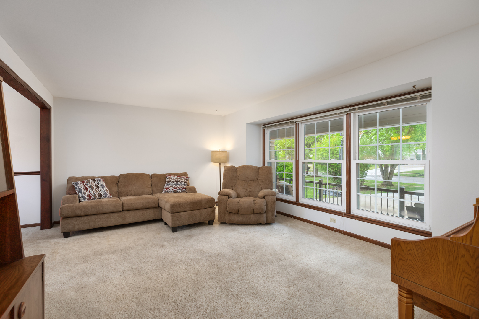 1616 Apache Drive Naperville, IL 60563 - Photo 10 of 36 a living room with furniture and a large window