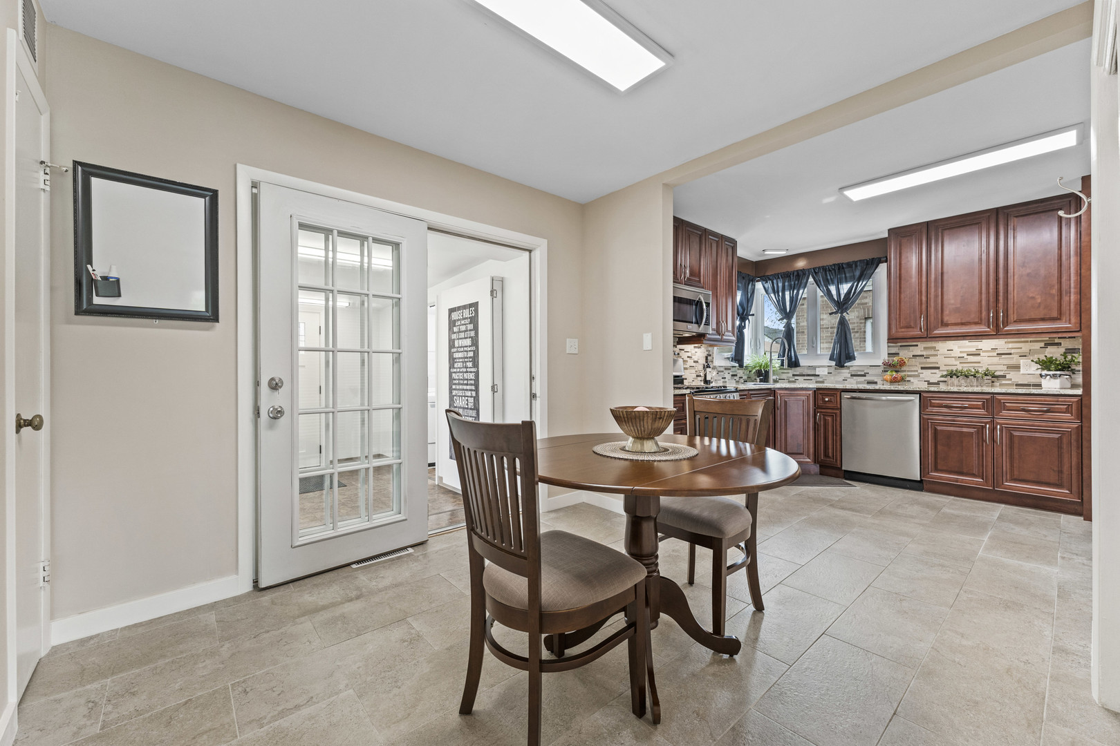 439 Highview Avenue Elmhurst, IL 60126 - Photo 13 of 42 a dining room with furniture and window
