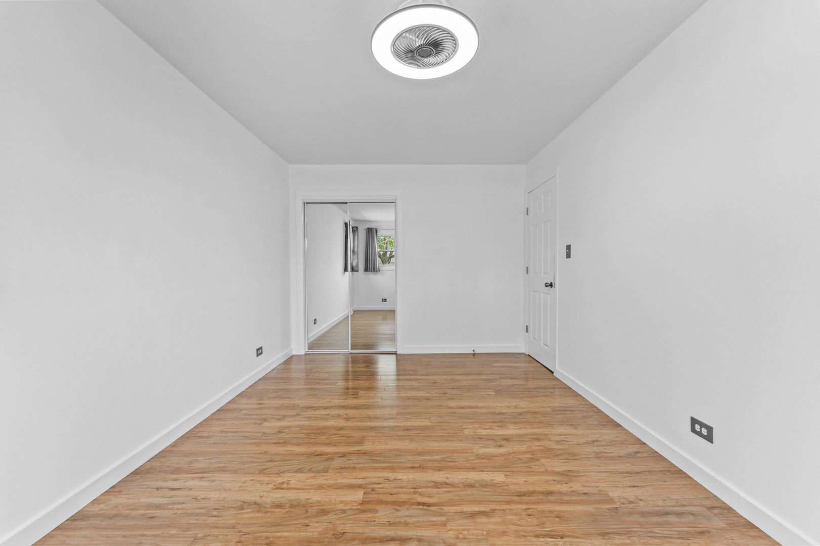 439 Highview Avenue Elmhurst, IL 60126 - Photo 16 of 42 a view of empty room with wooden floor