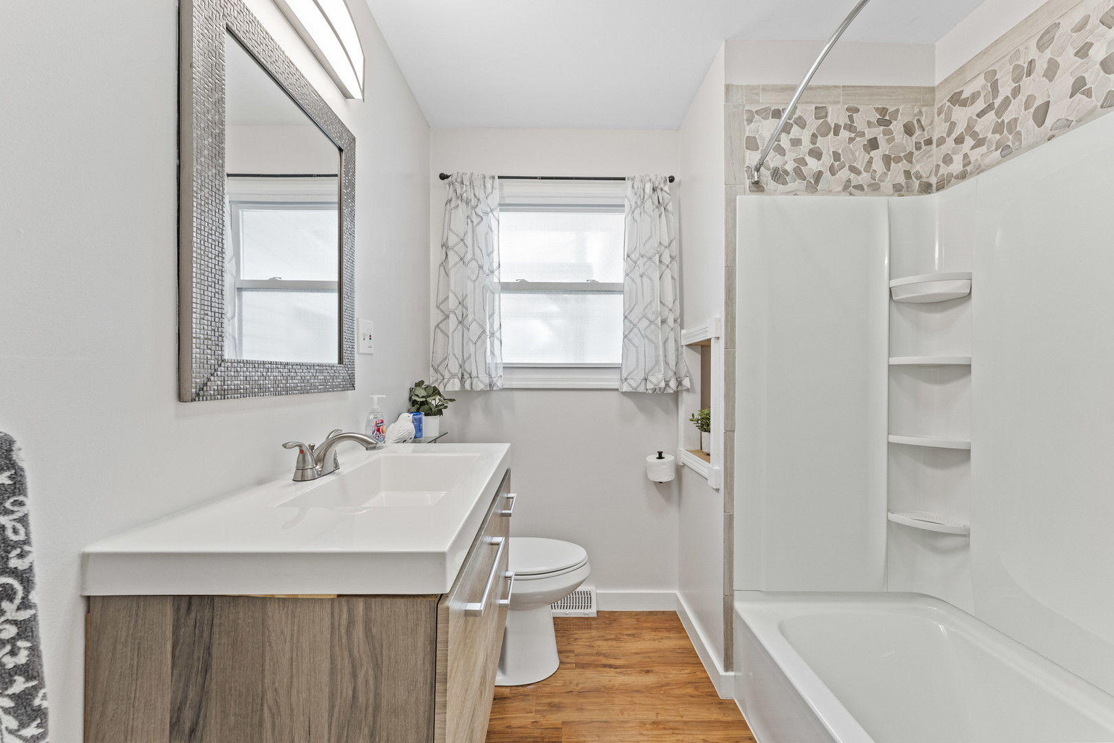 439 Highview Avenue Elmhurst, IL 60126 - Photo 17 of 42 a bathroom with a sink a toilet and shower