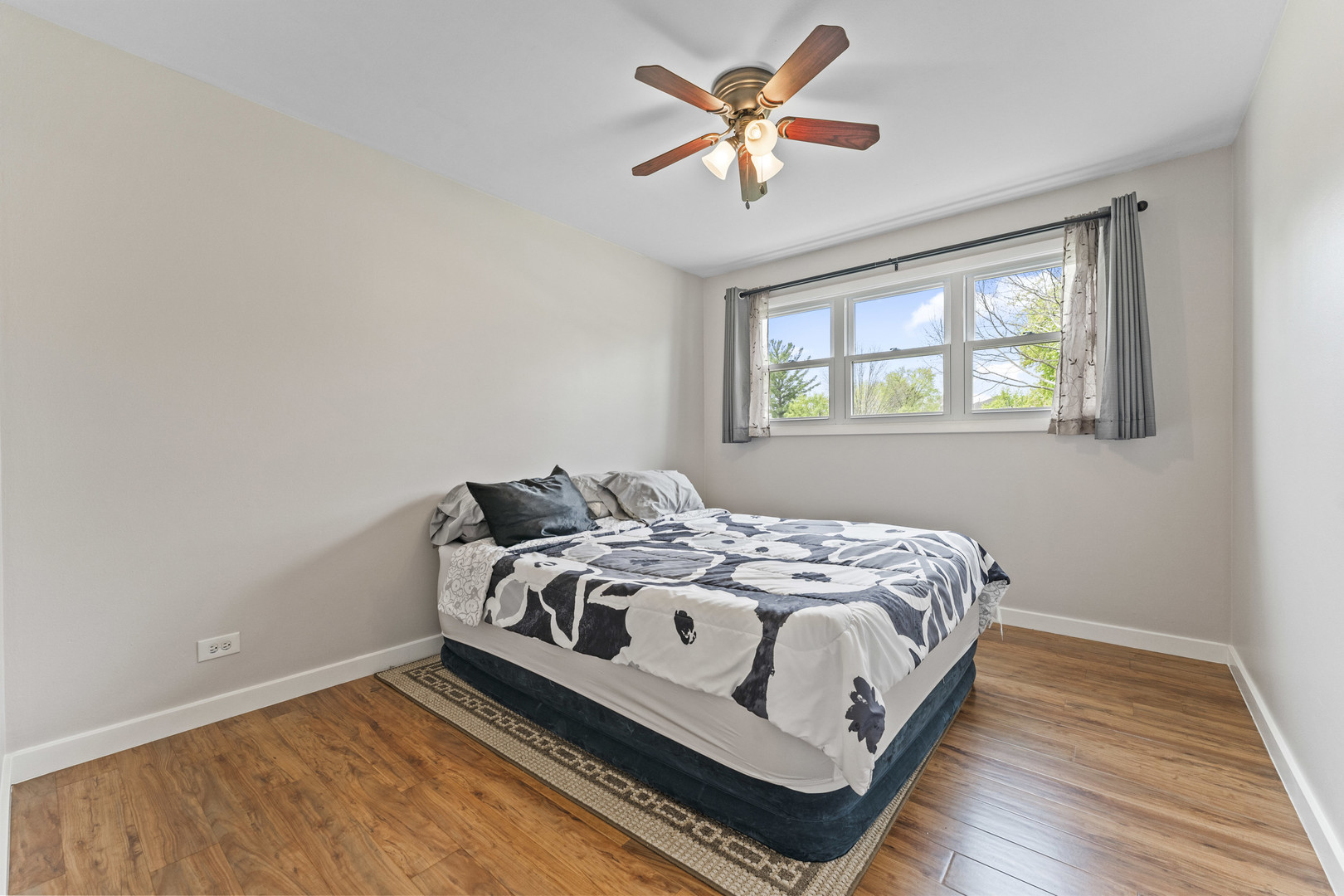439 Highview Avenue Elmhurst, IL 60126 - Photo 19 of 42 a bedroom with a bed and a window